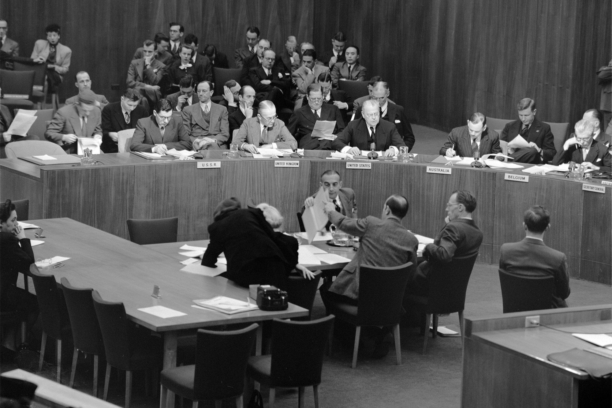 A photograph of a UN Security Council meeting on atomic energy in 1947.